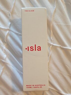 Isla The Elixir Cleanser & Exfoliant — White with Red
